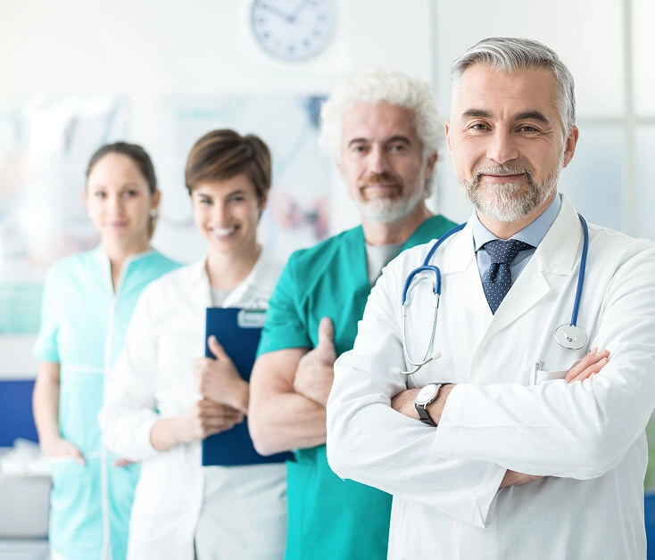 A team at a Boca Raton vein treatment center poses for varicose vein care.