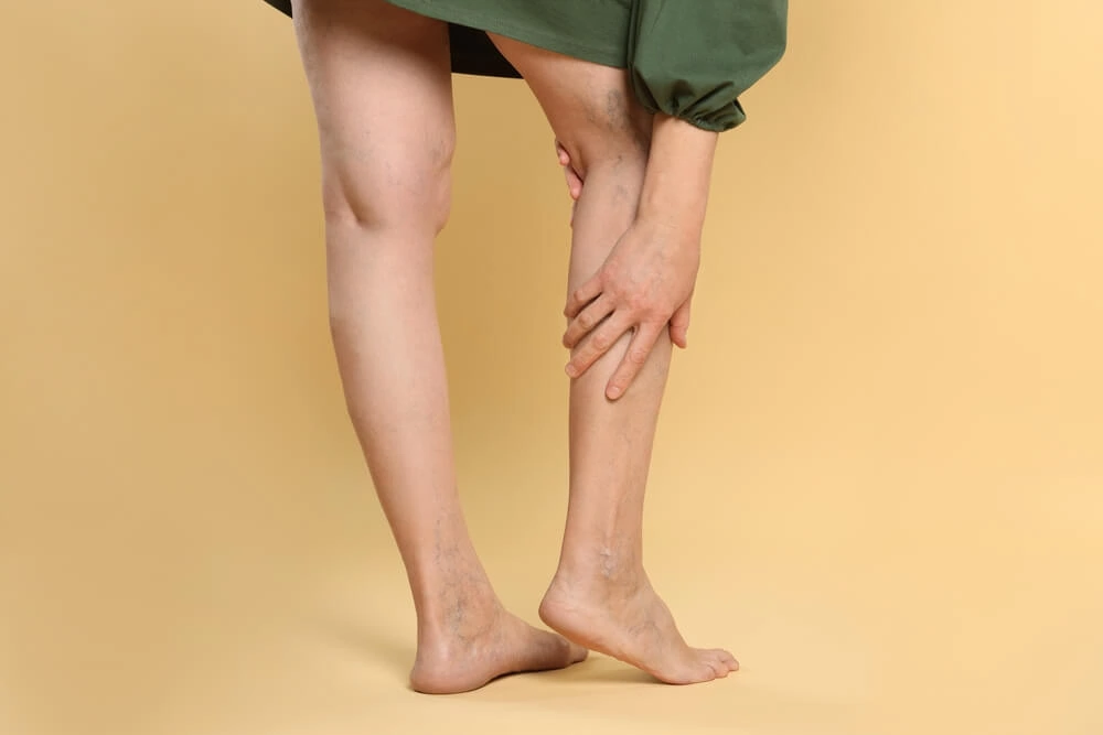 Throbbing or aching legs are common varicose vein symptoms